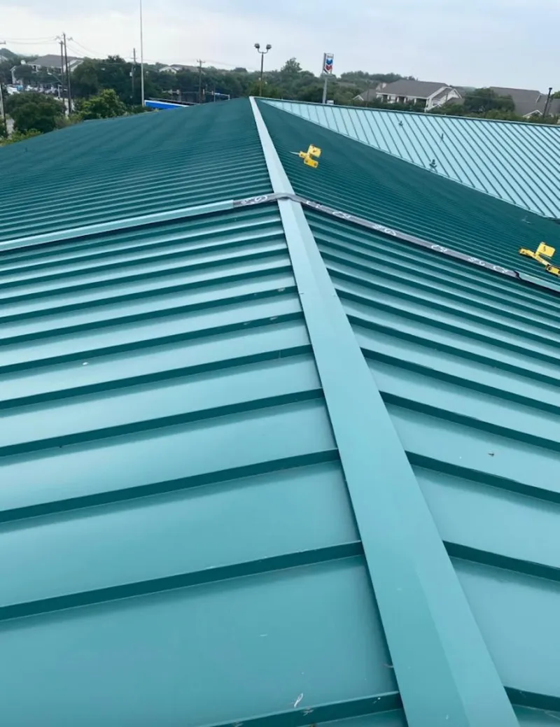 Green commercial metal roof ridge and valley for Metal Roof Repair in Bulverde
