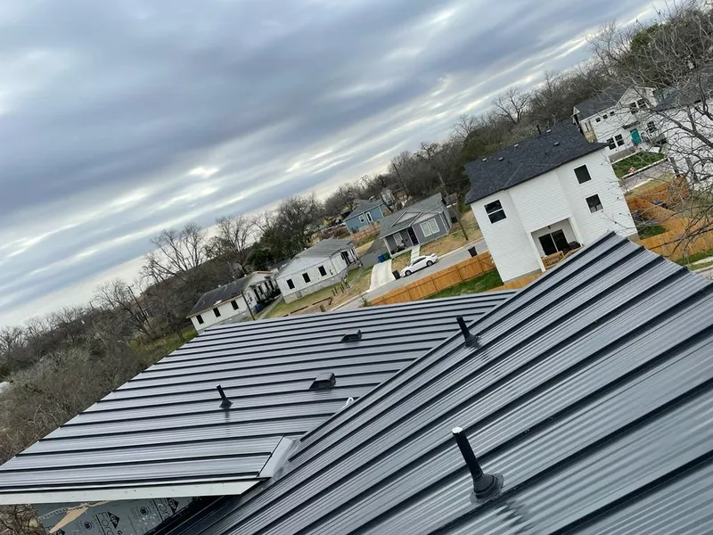 Standing seam metal roof panels with vents for Skylight Repair in Bulverde